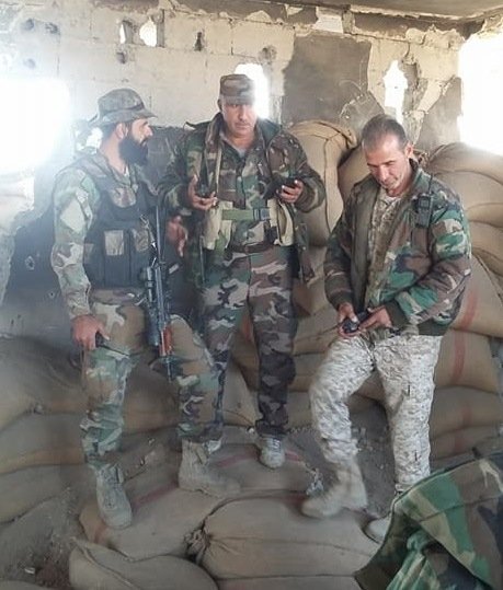 Suleiman Shaheen (right) with Colonel Yunis Mohammad (center) in Deir Ez Zor.